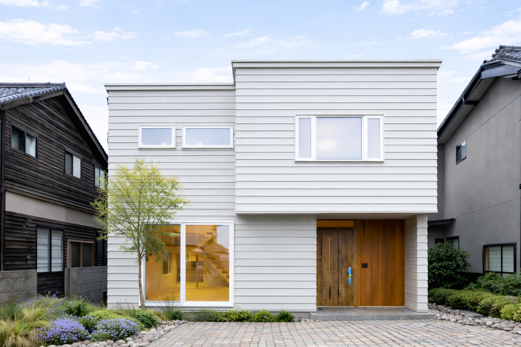 光が巡る、白の住まい